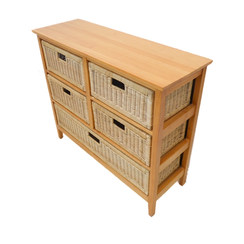 405 - A modern pine unit with four half-width wicker drawers and one full-width wicker drawer below, raise... 