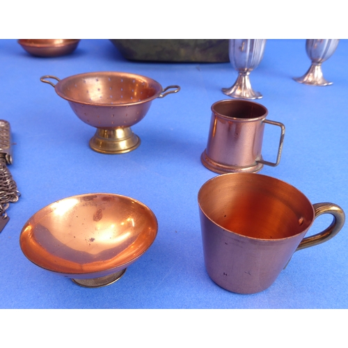 77 - A 19th century brass chamberstick and other metalware to include a pair of hallmarked silver peppere... 