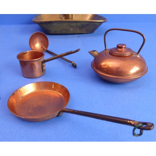 77 - A 19th century brass chamberstick and other metalware to include a pair of hallmarked silver peppere... 