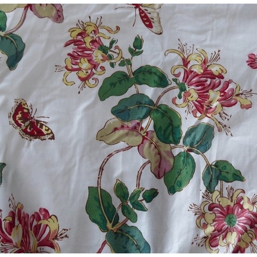 252 - A medley of single curtains, pelmets and bed valances: a terracotta and cream floral pattern curtain... 