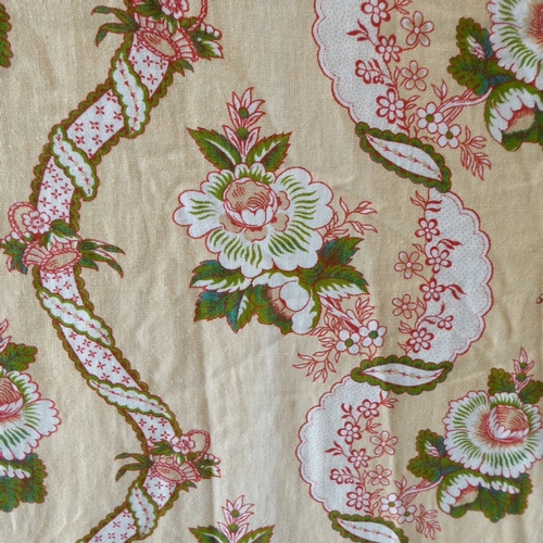 252 - A medley of single curtains, pelmets and bed valances: a terracotta and cream floral pattern curtain... 