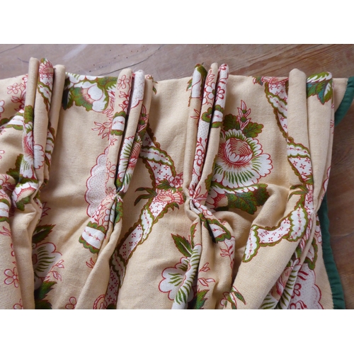 252 - A medley of single curtains, pelmets and bed valances: a terracotta and cream floral pattern curtain... 