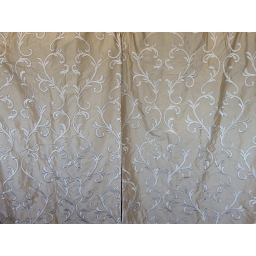 261 - A pair of curtains in champagne silk decorated with machine embroidery from Colefax & Fowler; goblet... 