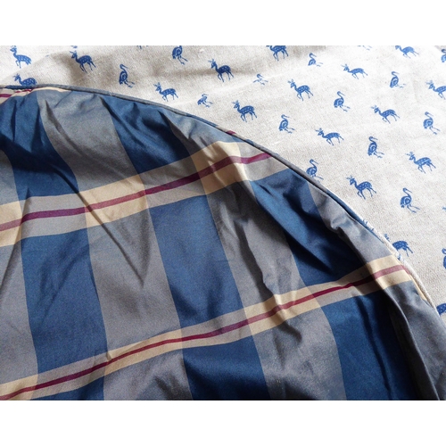 263 - A large double-sided bedspread in blue tartan silk effect fabric one side and a cream linen fabric o... 