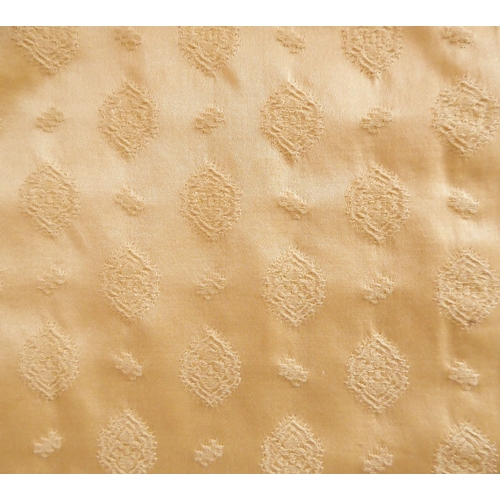 265 - Three bedspreads: A pair of gold heavy damask satin effect bedspreads with raised pattern, rounded c... 