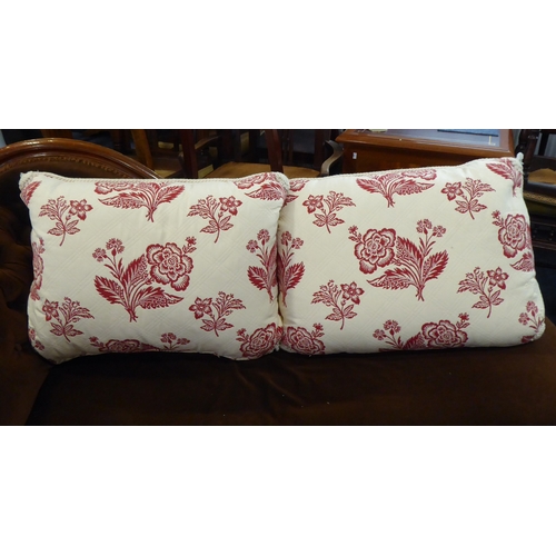 267 - Two large cream cushions with a burgundy floral design, removable covers, feather cushion pad, cream... 