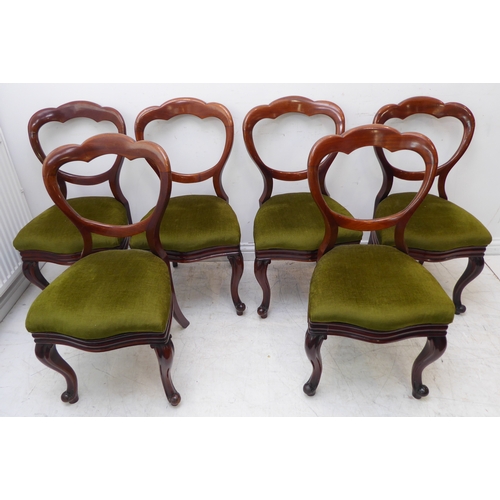 272 - A harlequin set of eight mid-19th century mahogany balloon-back chairs: six with drop-in green cordu... 