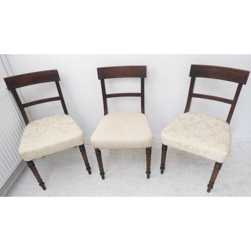 279 - A set of three early 19th century Regency period mahogany salon chairs: each with concave tablet sha... 