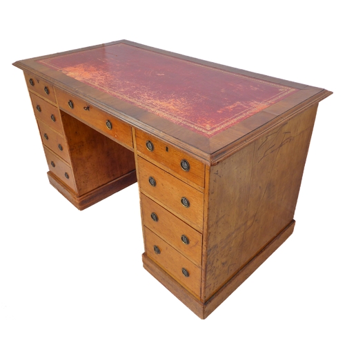 289 - A 19th mahogany one-piece pedestal desk: the gilt-tooled leather insert moulded top above an arrange... 