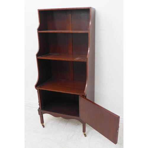 291 - A good early 20th century mahogany, crossbanded and rosewood-fronted waterfall-style bookcase: three... 