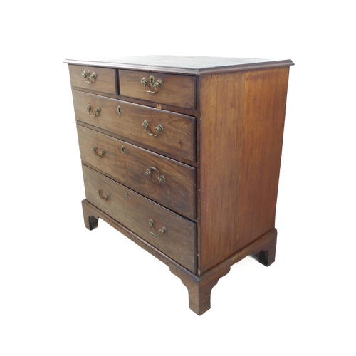 292 - A mid 18th century mahogany chest of pleasing proportions: the moulded top above two half-width and ... 