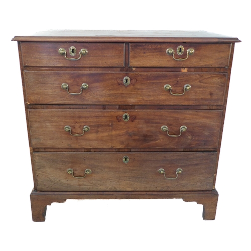 292 - A mid 18th century mahogany chest of pleasing proportions: the moulded top above two half-width and ... 