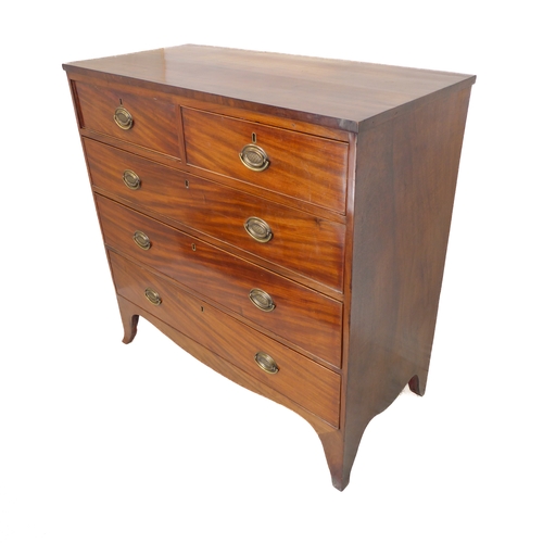 308 - An early 19th century mahogany chest: two half-width over three full-width graduated drawers, stampe... 