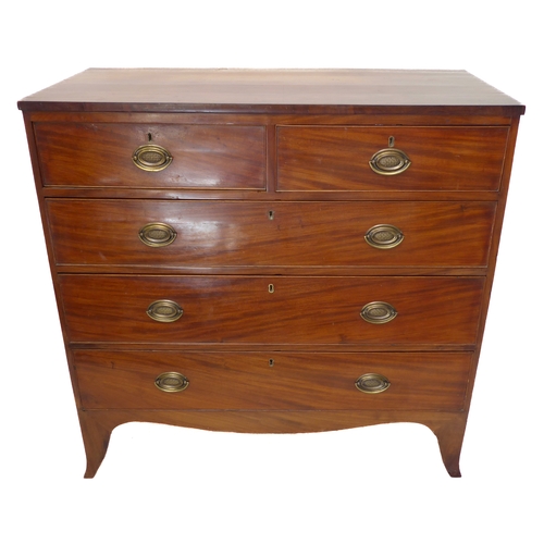 308 - An early 19th century mahogany chest: two half-width over three full-width graduated drawers, stampe... 