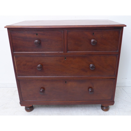 319 - A 19th century mahogany chest of small proportions: the thumbnail moulded top above two half-width a... 