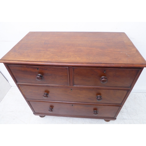 319 - A 19th century mahogany chest of small proportions: the thumbnail moulded top above two half-width a... 