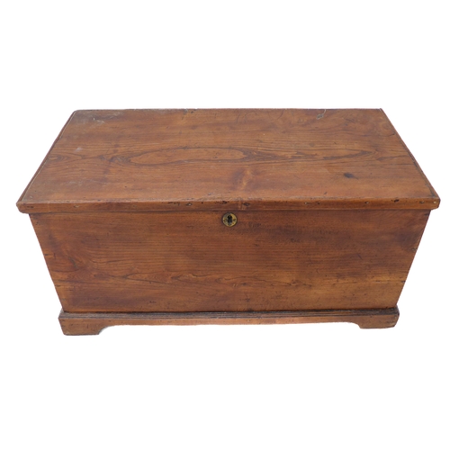 321 - An early to mid 19th century elm chest: the lid with strap hinges above short bracket feet (83cm wid... 