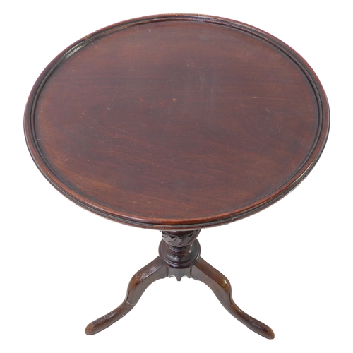 324 - A Georgian style (reproduction) mahogany wine table: dished-top above turned stem and tripod base wi... 