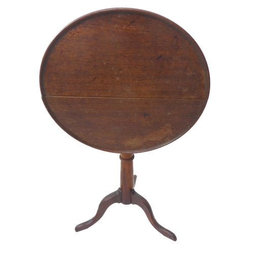 335 - A late 18th/19th century circular tilt-top mahogany occasional table with fruitwood stem and tripod ... 