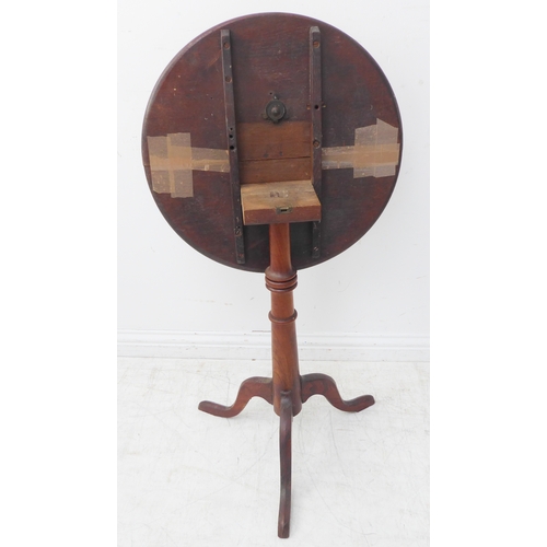 335 - A late 18th/19th century circular tilt-top mahogany occasional table with fruitwood stem and tripod ... 