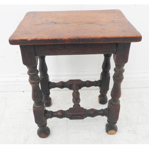 348 - A 19th century oak joint stool in 17th century style: the slightly overhanging top above turned and ... 