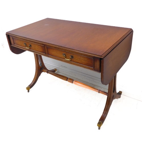 351 - A reproduction mahogany Regency-style sofa table: two true drawers and two dummy drawers opposing, d... 