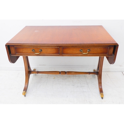 351 - A reproduction mahogany Regency-style sofa table: two true drawers and two dummy drawers opposing, d... 