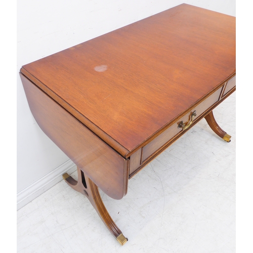 351 - A reproduction mahogany Regency-style sofa table: two true drawers and two dummy drawers opposing, d... 