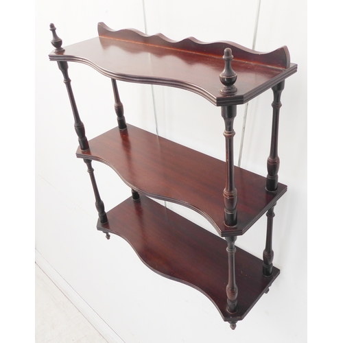 365 - A set of three serpentine-fronted wall shelves (48cm wide x 55.5cm high)