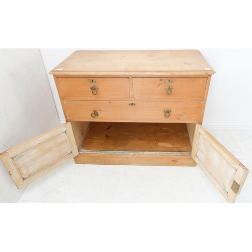 395 - A 19th century pine chest: moulded top above two half-width and a single full-width drawer, two pane... 