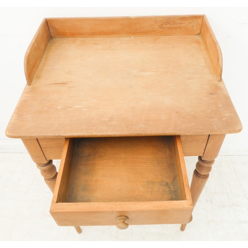 396 - A late 19th century pine washstand: three-quarter galleried top above a single drawer and turned tap... 