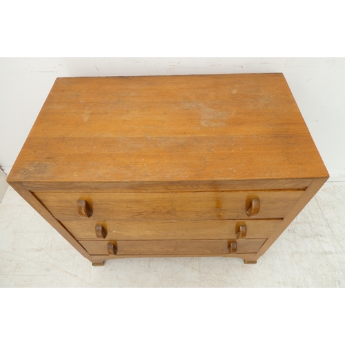 399 - Two similar Art Deco period light-oak three-drawer chests: with vertical Art Deco style handles and ... 