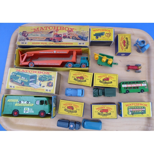 411 - Seven boxed Matchbox die-cast models, two unboxed and one empty box.
 7 BOXED: 
 Racing Car Transpor... 