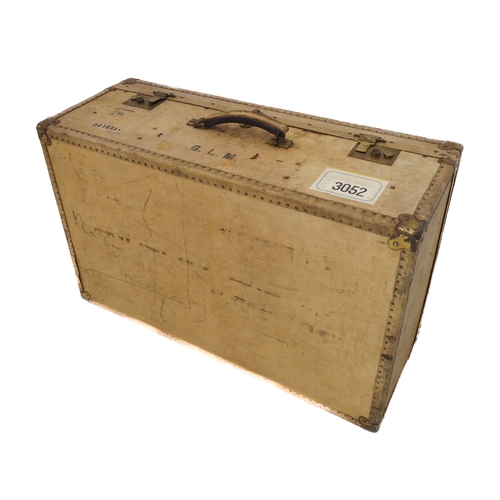 434 - A large vellum style brass-bound travelling suitcase (77cm wide x 48cm deep x 30cm high)