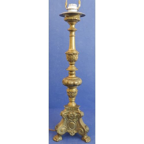 437 - A large and heavy brass pricket stick style table lamp and shade on triform base (approx. 88cm high ... 