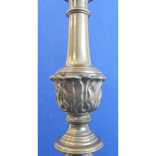 437 - A large and heavy brass pricket stick style table lamp and shade on triform base (approx. 88cm high ... 