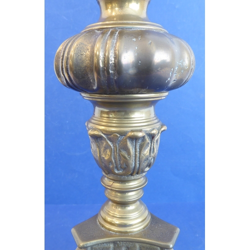 437 - A large and heavy brass pricket stick style table lamp and shade on triform base (approx. 88cm high ... 