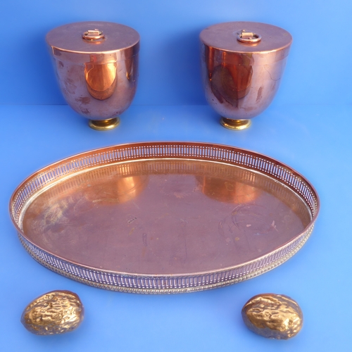 78 - An early 20th century oval copper tray with pierced gallery, together with a pair of copper and bras... 