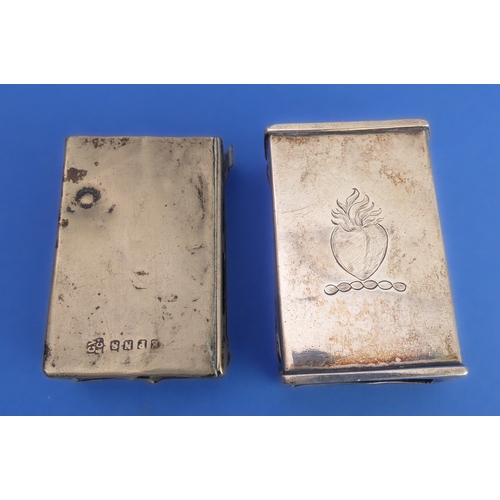 83 - A silver cigarette case and two matchbox-holders:
 the early 20th century hallmarked silver kidney-s... 