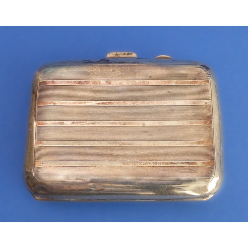 83 - A silver cigarette case and two matchbox-holders:
 the early 20th century hallmarked silver kidney-s... 