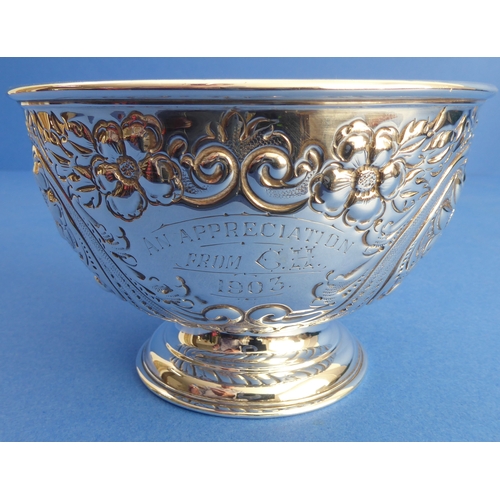 86 - A hallmarked silver sugar bowl: gilded interior and decorated in repoussé style with flowerheads, C-... 