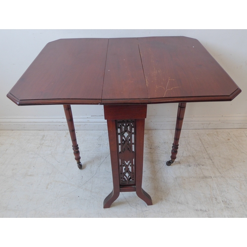 297 - An Edwardian period walnut Sutherland table with unusual pierced rectangular stretcher (74cm leaves ... 