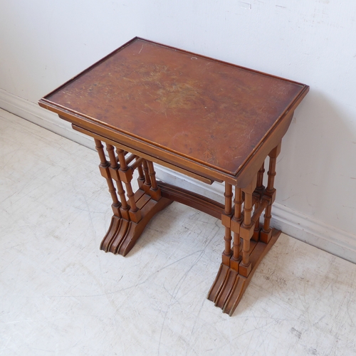 342 - A reproduction set of three yew wood quartetto-style tables (51cm wide)