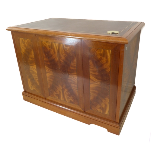 349 - A flame veneered mahogany office style side cabinet, the leathered moulded top above two flush side ... 