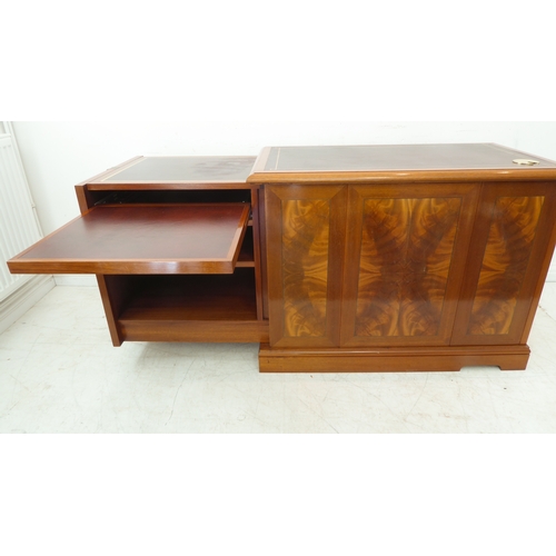 349 - A flame veneered mahogany office style side cabinet, the leathered moulded top above two flush side ... 