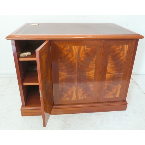 349 - A flame veneered mahogany office style side cabinet, the leathered moulded top above two flush side ... 