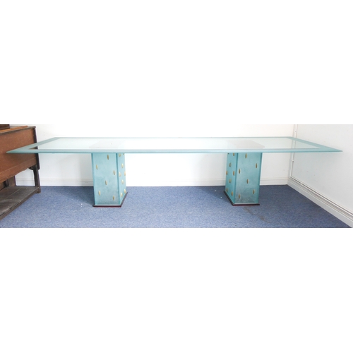 388 - A very large and heavy modern designer-style glass boardroom or dining table: the central rectangula... 