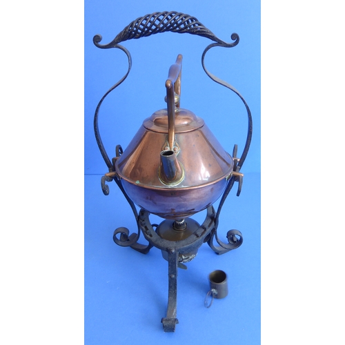 73 - An early 20th century Aesthetic-style copper spirit kettle on iron stand, together with two brass la... 