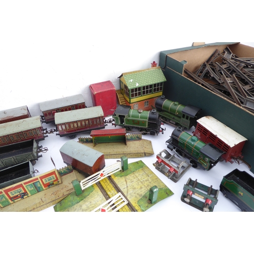 429A - A selection of early/mid 20th century Hornby tin-plate railway to include three clockwork engines (t... 