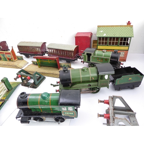 429A - A selection of early/mid 20th century Hornby tin-plate railway to include three clockwork engines (t... 